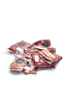Assorted vacuum-packed cuts of premium, regenerative, grass-fed beef cuts from Highlands Natural Australia including steaks, sausages and burger patties.