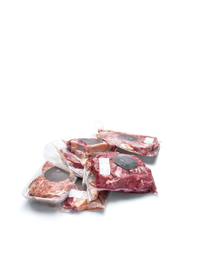 Assorted vacuum-packed cuts of premium, regenerative, grass-fed beef cuts from Highlands Natural Australia including steaks, sausages and burger patties.