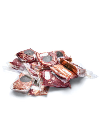 Assorted vacuum-packed cuts of premium, regenerative, grass-fed beef cuts from Highlands Natural Australia including steaks, sausages and burger patties.
